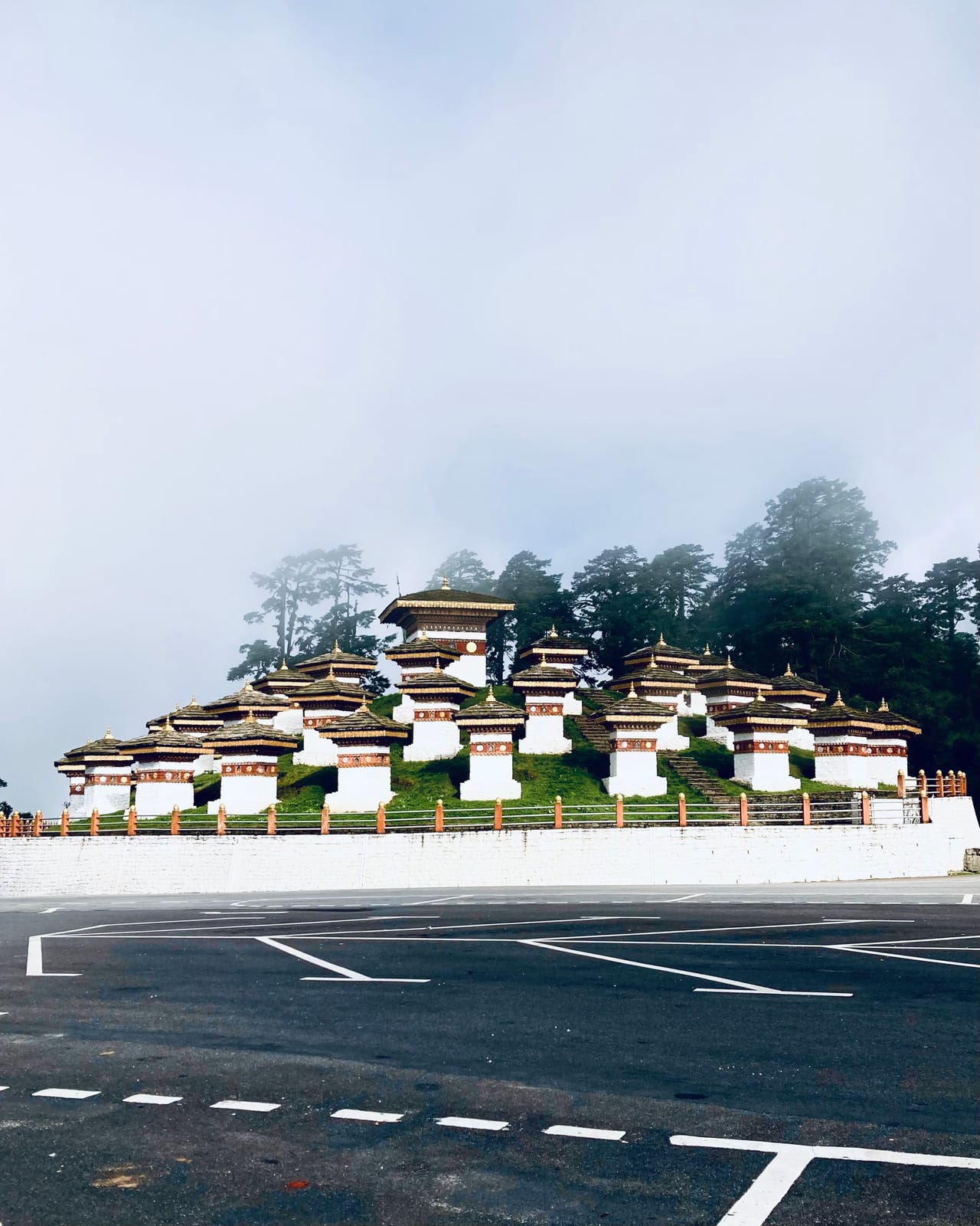 The 108 chortens of Dochula Pass in drifting mist