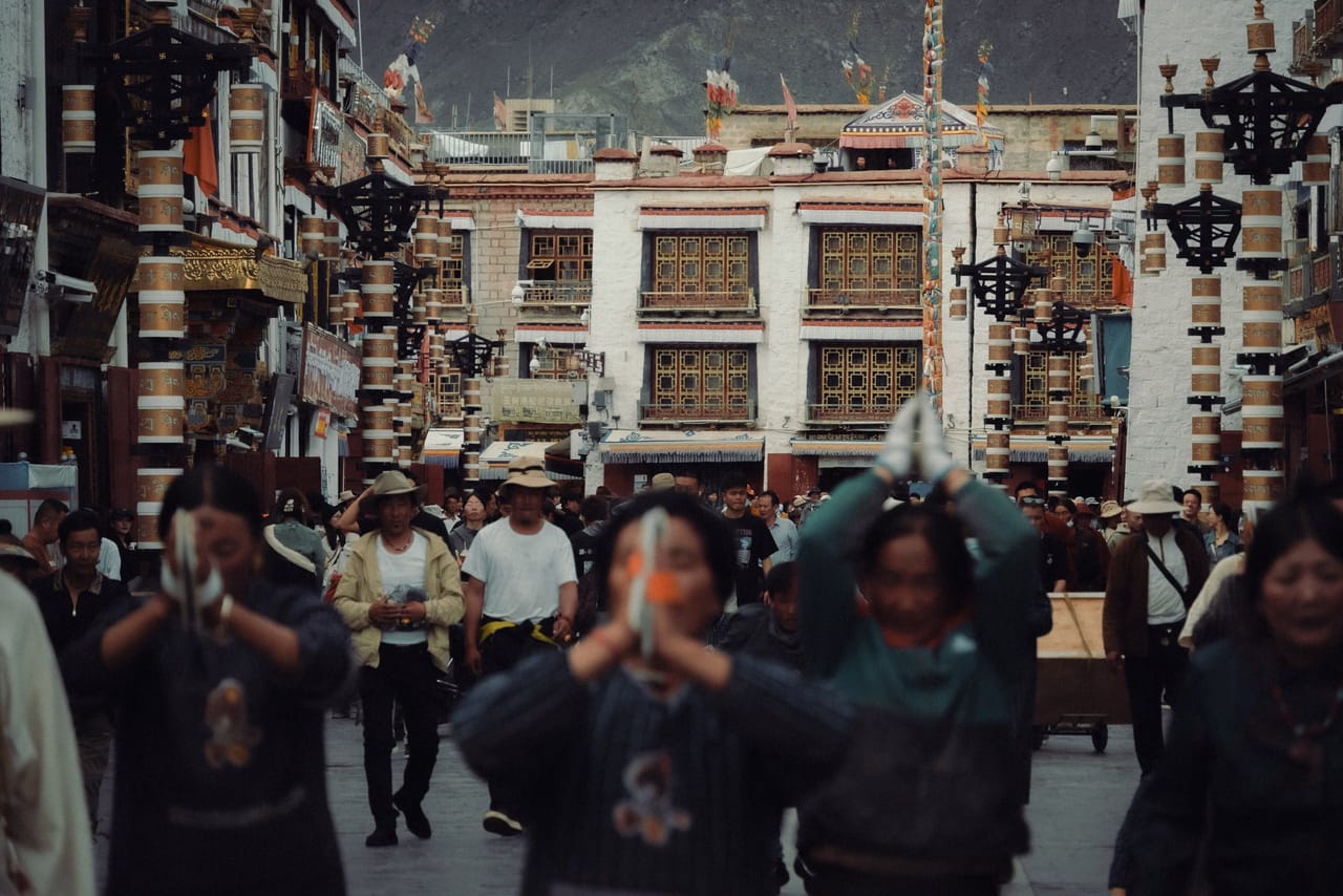 Pilgrims and prayer wheels on the Barkhor circuit in old Lhasa